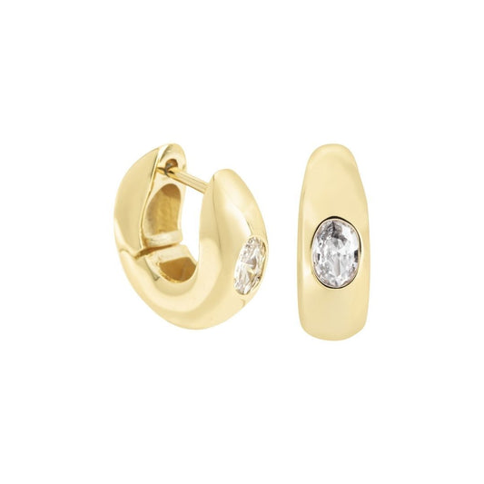 Product photo of chunky gold huggie earring with oval shaped clear stone